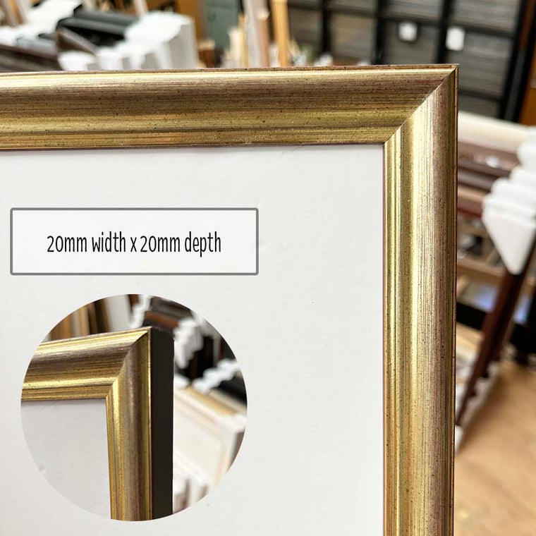 A2 Photo Frame in a Champagne with Grey finish made from quality custom framing materials. This frame is a one off made from excess stock and includes quality foamboard, Perspex, and Wire Pack for both vertical and horizontal hanging on the wall. This frame is suited to an A2 (42cm x 59.4cm) Photo or artwork, or you can add a matboard insert to fit a smaller A3, 11"x14", A4 or 8"x10" Photo or Artwork