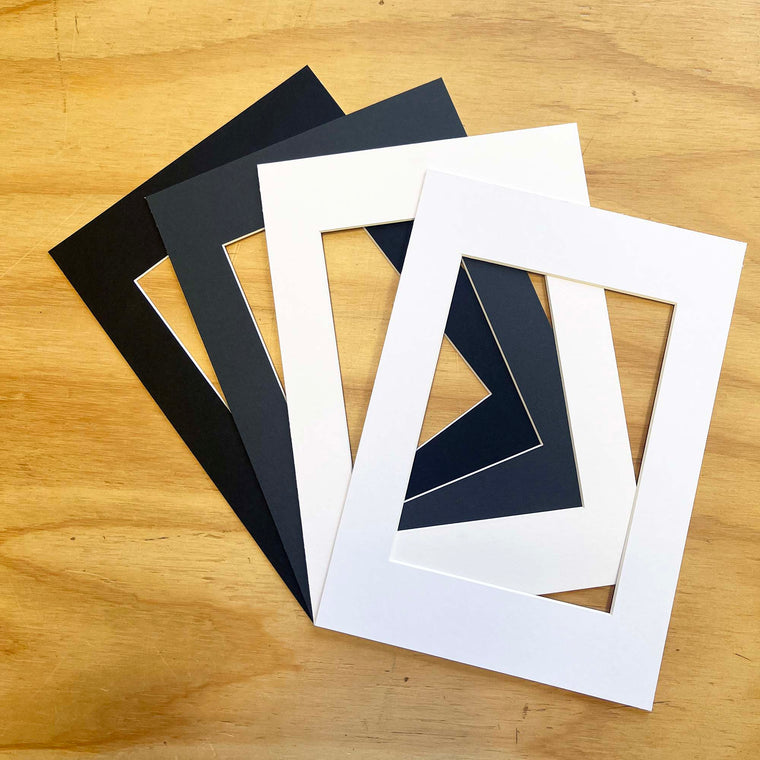 Photo Frame Matboard Insert in your choice of Bright White, Off White, Black or Charcoal Grey. Available to fit in frame size A1, A2, A3, 50x70cm or 16"x20" and window cut to suit your size artwork.